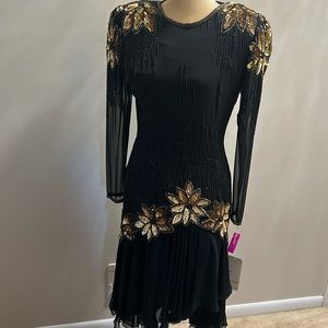 Beautiful sexy sequin beaded dress. Lots of beads and sequins